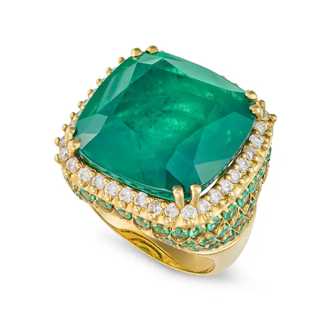 MORAGLIONE, A SOUDE EMERALD, EMERALD AND ROUND BRILLIANT CUT DIAMONDS in 18ct yellow gold, set