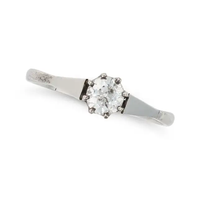 AN ART DECO SOLITAIRE DIAMOND RING in platinum, set with an old European cut diamond of