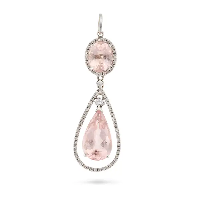 A MORGANITE AND DIAMOND PENDANT comprising a pear cut morganite drop of approximately 5.09 carats