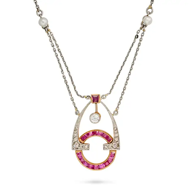 AN ANTIQUE RUBY, DIAMOND AND PEARL PENDANT NECKLACE, EARLY 20TH CENTURY the openwork pendant set