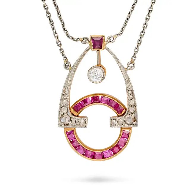 AN ANTIQUE RUBY, DIAMOND AND PEARL PENDANT NECKLACE, EARLY 20TH CENTURY the openwork pendant set