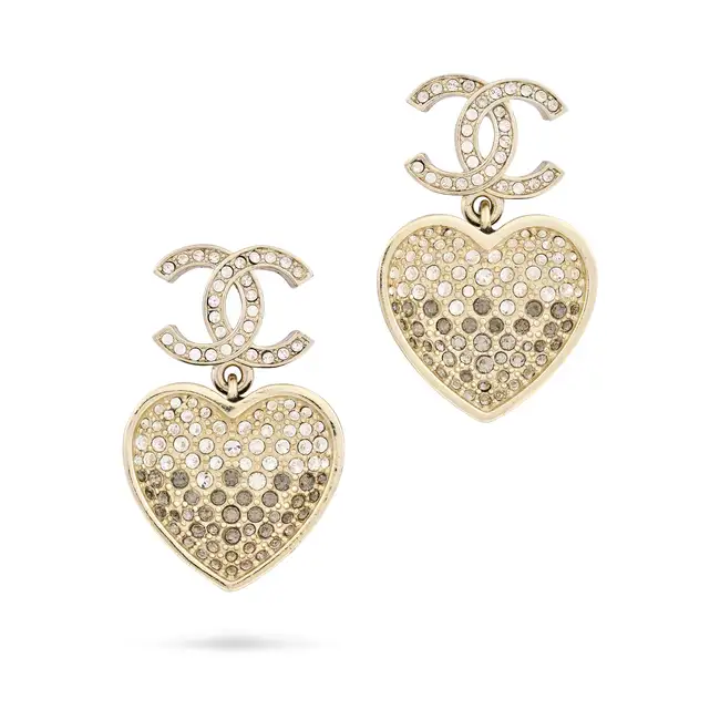 CHANEL, A PAIR OF CC HEART EARRINGS each comprising an interlocking logo set with white diamantes,