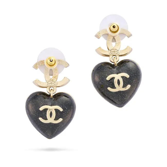 CHANEL, A PAIR OF CC HEART EARRINGS each comprising an interlocking logo set with white diamantes,