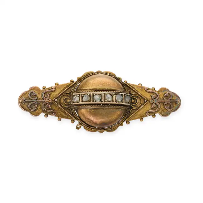 NO RESERVE - AN ANTIQUE ETRUSCAN REVIVAL DIAMOND BROOCH the domed centre set with a row of rose