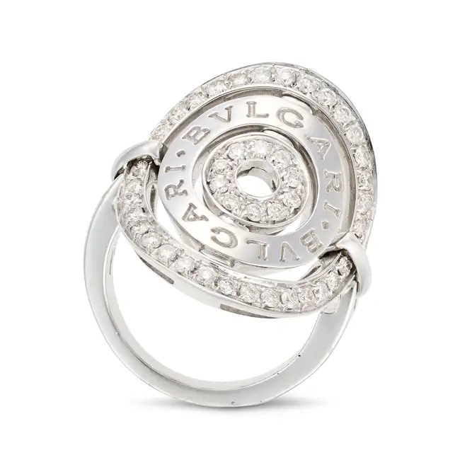 BULGARI, A DIAMOND ASTRALE SHIELD RING the shield shaped face comprising concentric circular