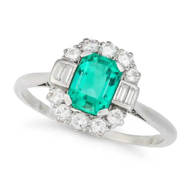 CROPP & FARR, AN ART DECO EMERALD AND DIAMOND DRESS RING in platinum, set with an octagonal step cut