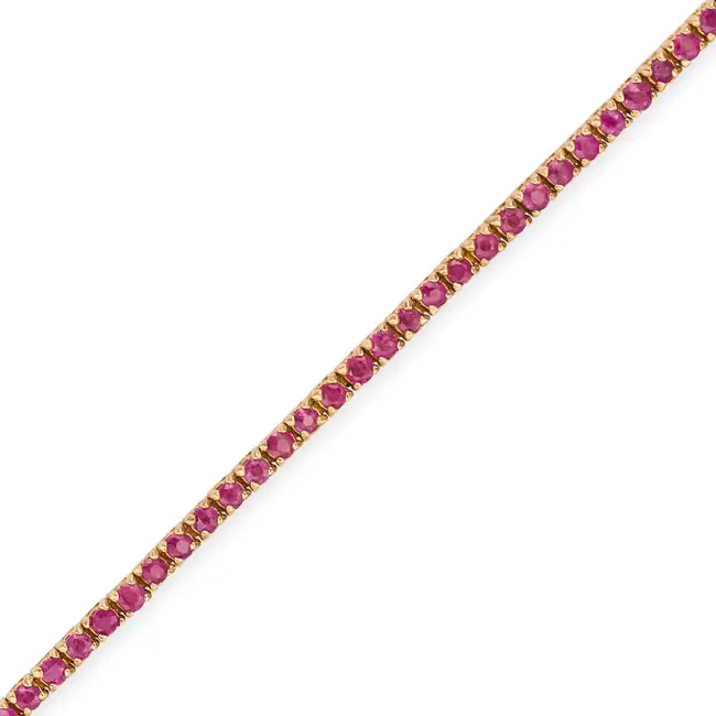 A RUBY LINE BRACELET in 18ct yellow gold, comprising a row of round cut rubies, stamped 750, 16.5cm,