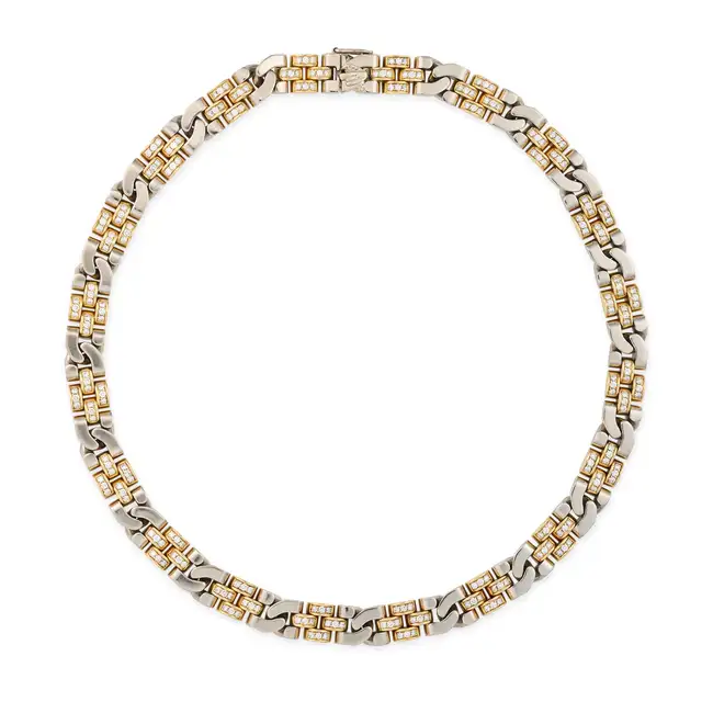 A DIAMOND CHAIN NECKLACE in 18ct yellow gold and white gold, comprising a row of brick and fancy