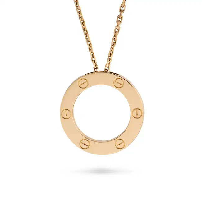 CARTIER, A GOLD LOVE PENDANT NECKLACE in 18ct rose gold, the circular pendant punctuated by six