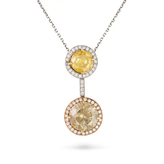 A FANCY COLOURED DIAMOND PENDANT NECKLACE the pendant set with a round brilliant cut yellow