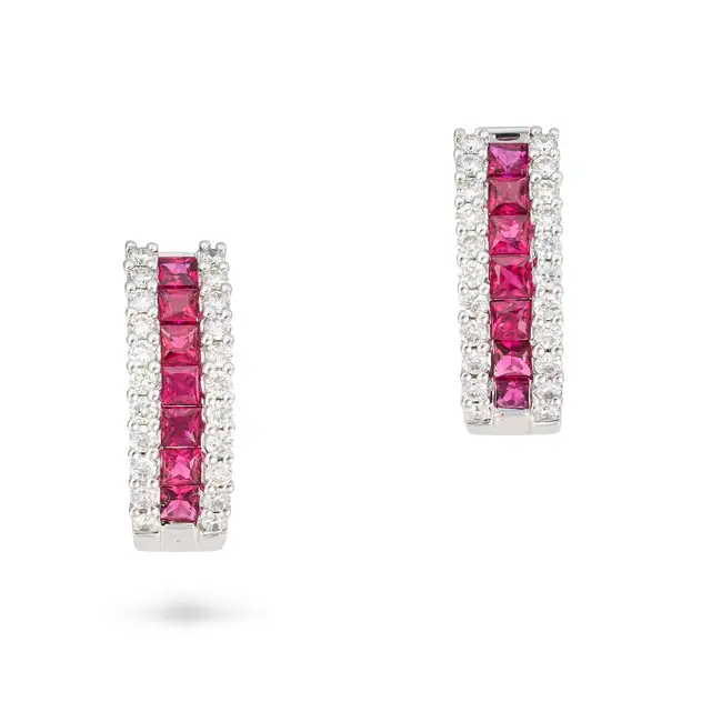 A PAIR OF RUBY AND DIAMOND HOOP EARRINGS in 18ct white gold, each designed as a hoop set with a