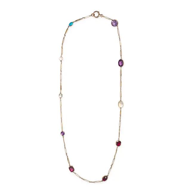 AN ANTIQUE MULTI GEM CHAIN NECKLACE in yellow gold, comprising a fancy link chain set with