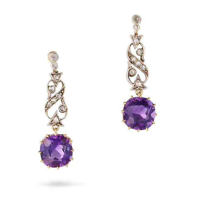 A PAIR OF AMETHYST AND DIAMOND DROP EARRINGS each comprising a scrolling link set with rose cut