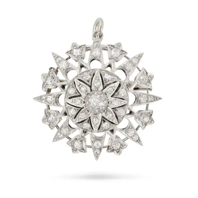 AN ANTIQUE DIAMOND FLOWER BROOCH / PENDANT, 19TH CENTURY in yellow gold and silver, designed as a