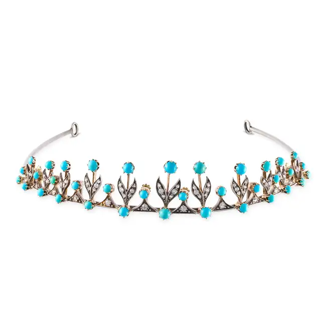 AN ANTIQUE TURQUOISE AND DIAMOND FRINGE TIARA comprising a graduating foliate stye fringe set with