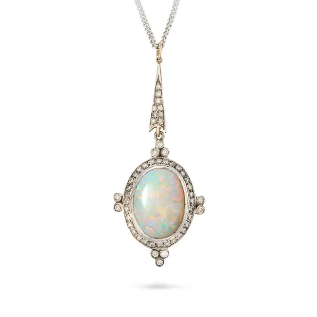 AN OPAL AND DIAMOND PENDANT NECKLACE the pendant set with an oval cabochon opal within a border of