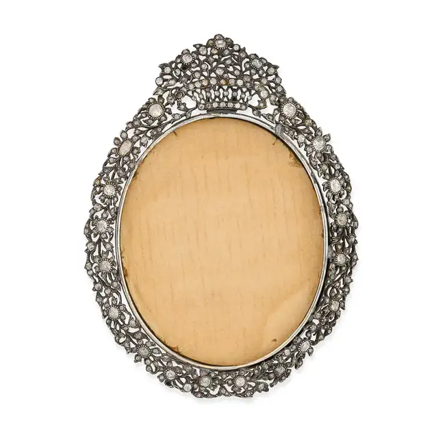 A FINE ANTIQUE GEORGIAN DIAMOND PORTRAIT MINIATURE FRAME, CIRCA 1800 in silver, the oval frame in