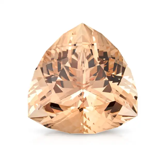 AN UNMOUNTED NATURAL TOPAZ fancy mixed cut, 82.55 carats. Accompanied by a gemmological report