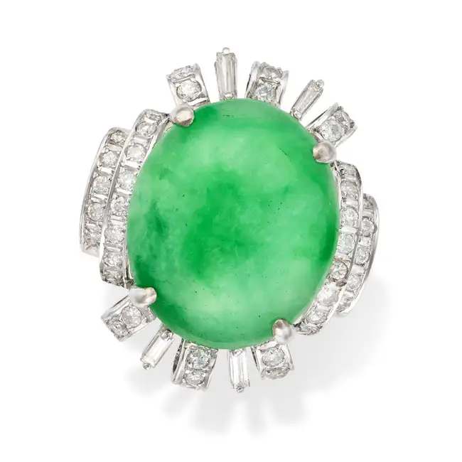 ​AN UNTREATED JADEITE JADE AND DIAMOND RING set with an oval cabochon jadeite jade of