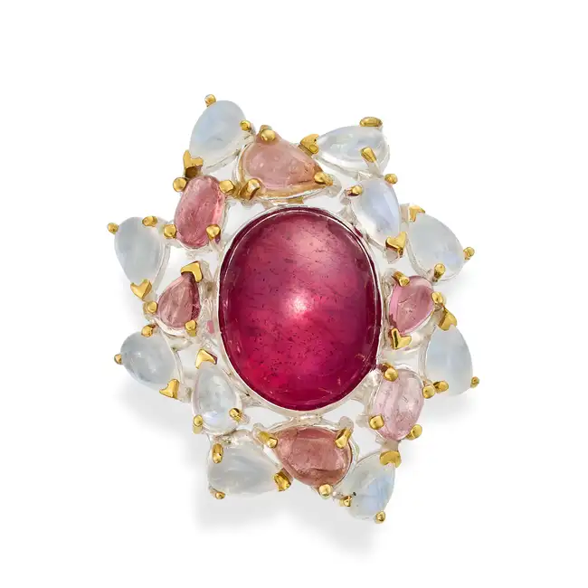 NO RESERVE - A GLASS-FILLED RUBY, MOONSTONE AND PINK TOURMALINE DRESS RING set with an oval cabochon
