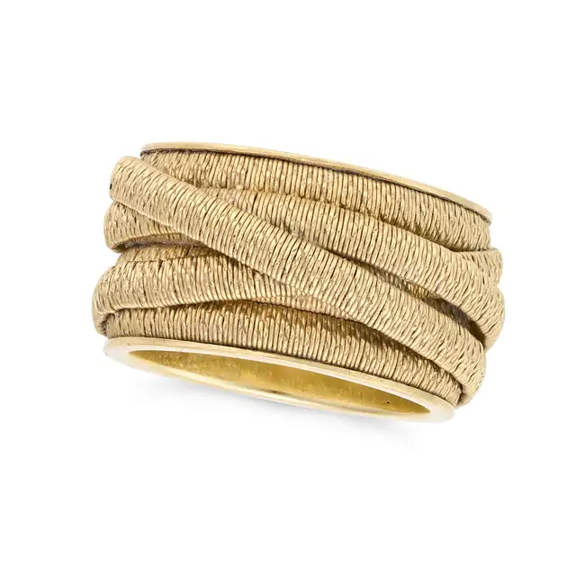 MARCO BICEGO, A GOLD CAIRO RING in 18ct yellow gold, designed as six interlocking woven bands,