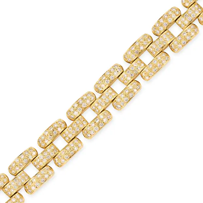 A VINTAGE FRENCH DIAMOND BRACELET in 18ct yellow gold, comprising rows of brick links pave set