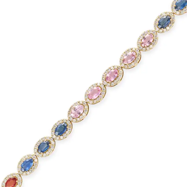 NO RESERVE - A MULTICOLOUR SAPPHIRE AND DIAMOND BRACELET comprising a single row of oval cut orange,