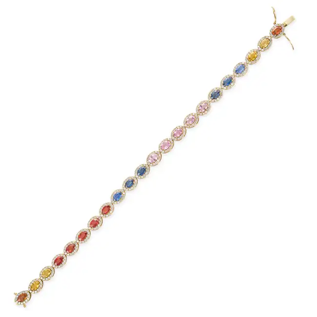 NO RESERVE - A MULTICOLOUR SAPPHIRE AND DIAMOND BRACELET comprising a single row of oval cut orange,