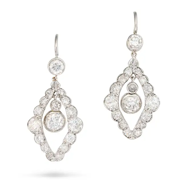 A PAIR OF DIAMOND DROP EARRINGS each of openwork design, set with old European cut diamond drops