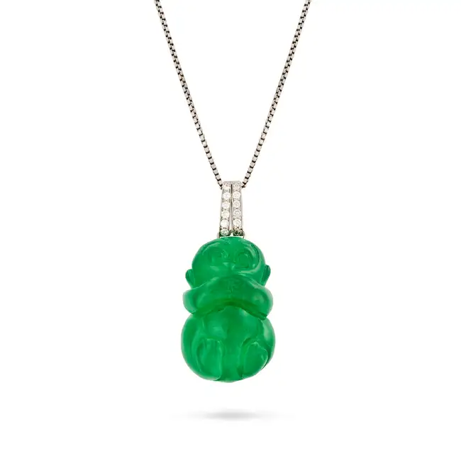 A JADEITE JADE AND DIAMOND PENDANT NECKLACE comprising a jadeite jade pendant carved to depict a