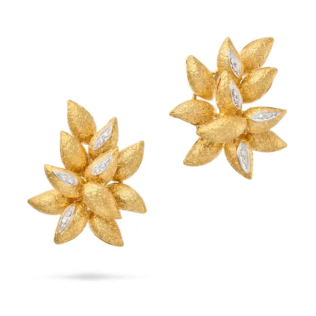 A PAIR OF ITALIAN DIAMOND CLIP EARRINGS each in stylised foliate design, accented by round cut