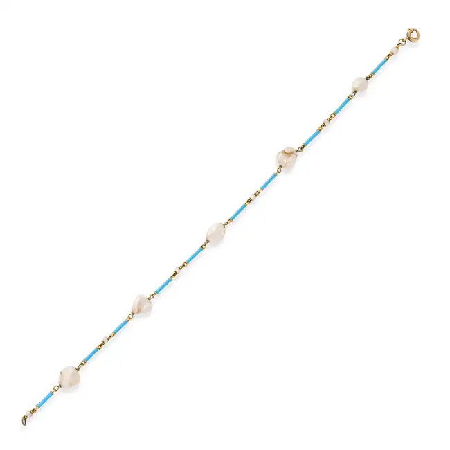 A PEARL AND ENAMEL BRACELET comprising a row of batons decorated with turquoise enamel, punctuated