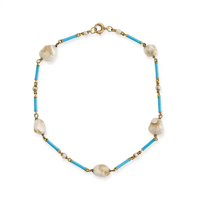 A PEARL AND ENAMEL BRACELET comprising a row of batons decorated with turquoise enamel, punctuated