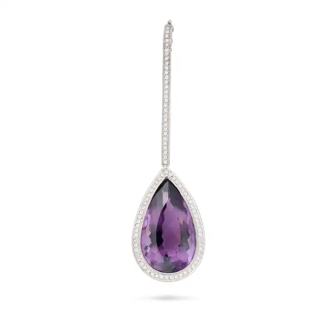NO RESERVE - AN AMETHYST AND DIAMOND PENDANT in white gold, set with a pear cut amethyst of