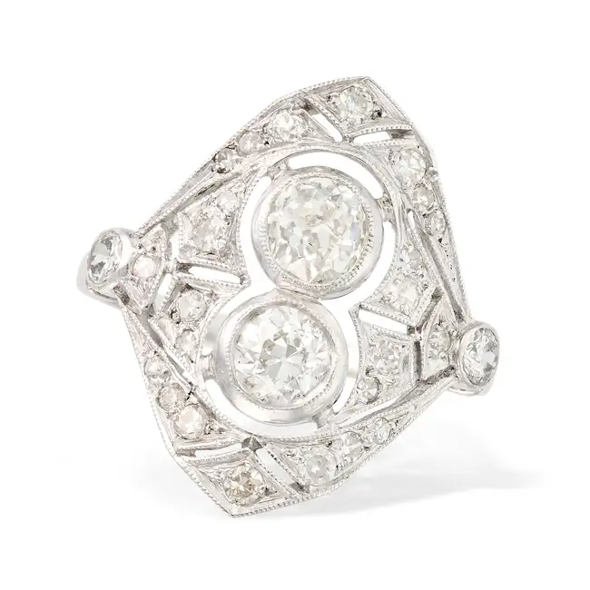 A FINE DIAMOND DRESS RING the pierced face set with two principal old cut diamonds of