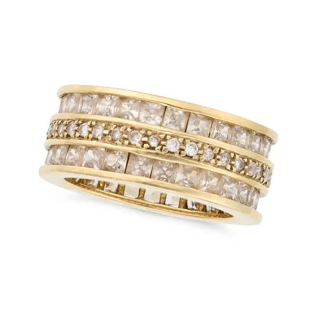 A CUBIC ZIRCONIA FULL ETERNITY RING set all around with three rows of round brilliant and princess