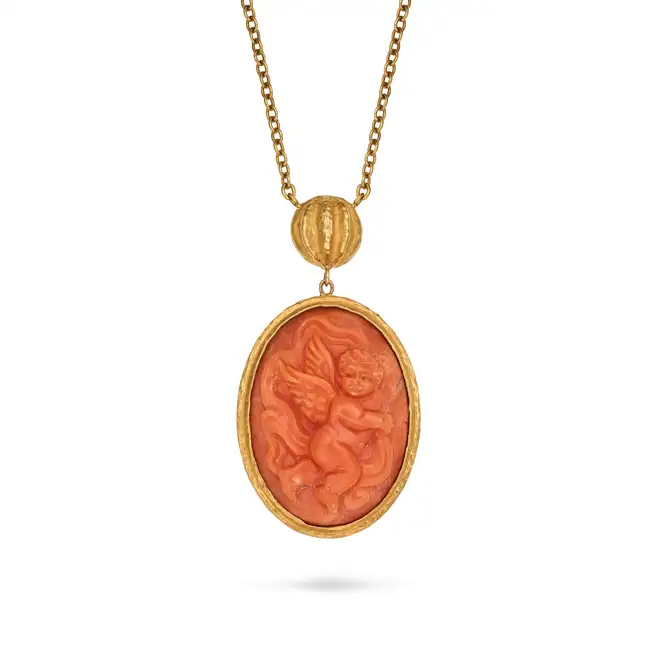 FAVERO, A CORAL CAMEO PENDANT NECKLACE in 18ct rose gold, the pendant set with a coral cameo