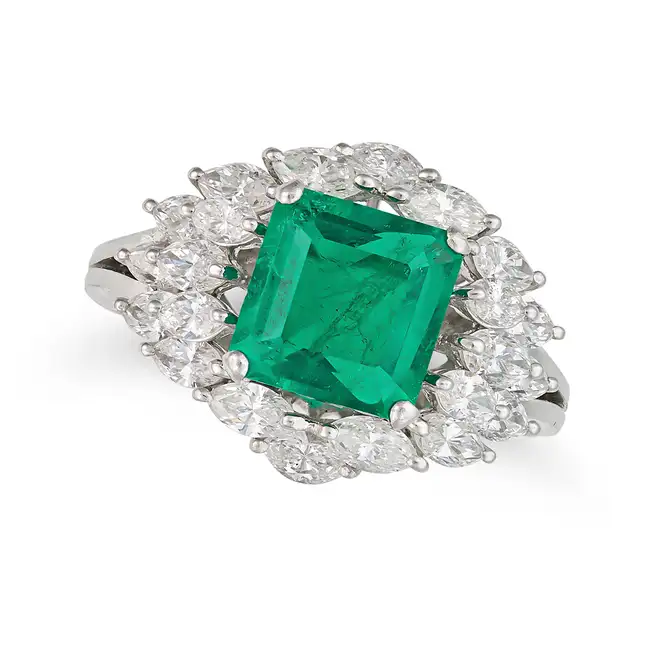 A FINE EMERALD AND DIAMOND CLUSTER RING set with an octagonal step cut emerald of approximately 1.66