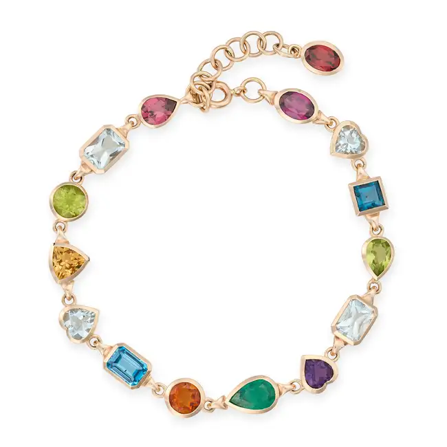 A MULTI GEM BRACELET comprising a row of oval, heart, square step, pear, octagonal step, round and