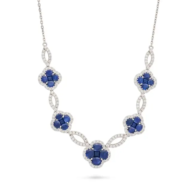 NO RESERVE - A SAPPHIRE AND DIAMOND NECKLACE in 18ct white gold, comprising five floral links set