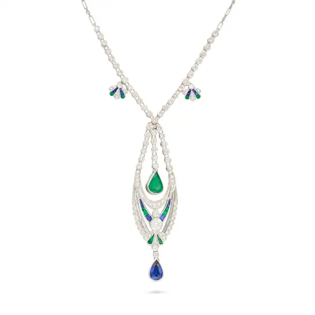 AN EMERALD, SAPPHIRE AND DIAMOND PENDANT NECKLACE the openwork tapering pendant set with round