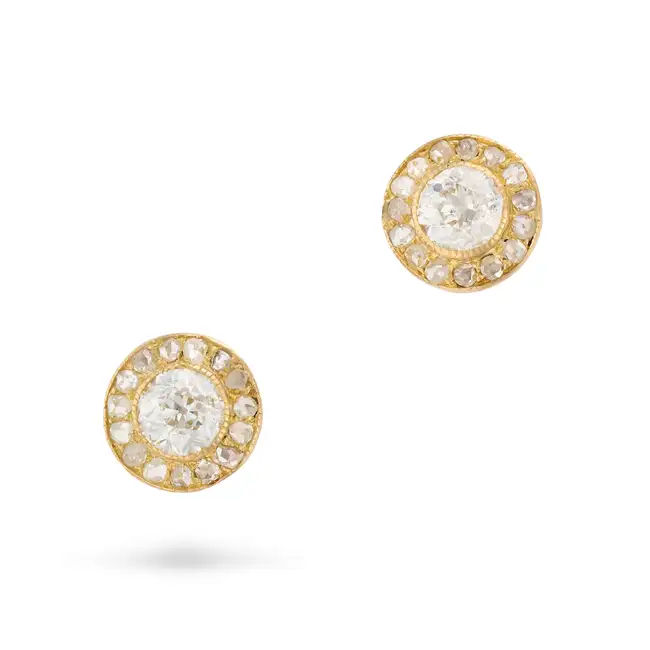 A PAIR OF DIAMOND CLUSTER STUD EARRINGS each set with an old cut diamond within a cluster of rose
