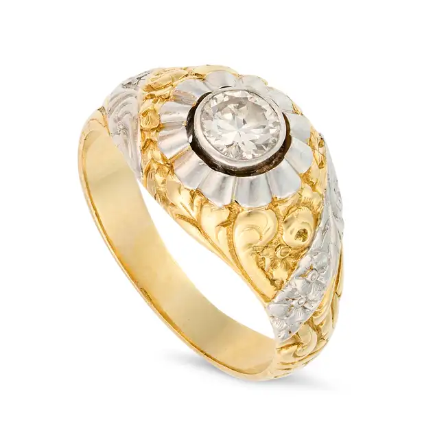 A DIAMOND DRESS RING set with a transitional cut diamond, the bombe mount with chased engraved
