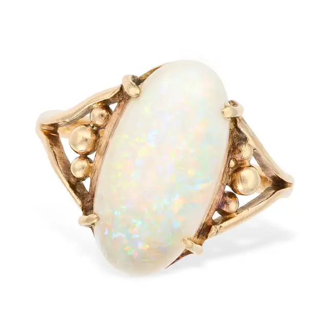 NO RESERVE - AN OPAL RING in yellow gold, set with a cabochon opal, no assay marks, size S / 9.25,