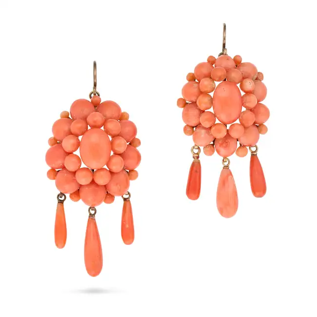 A PAIR OF ANTIQUE CORAL DROP EARRINGS each set with a cluster of oval and round cabochon corals,