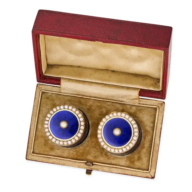 A PAIR OF ANTIQUE PEARL AND ENAMEL PILL POTS comprising two pill pots decorated with blue enamel,