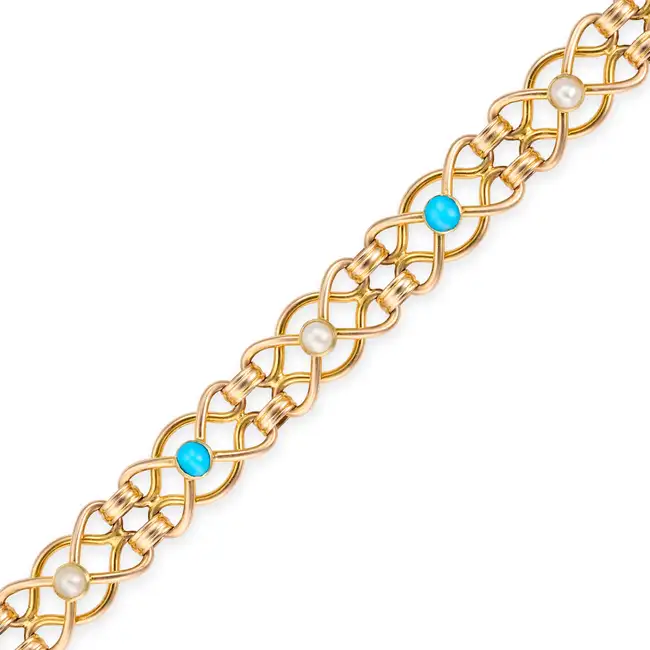 AN ANTIQUE TURQUOISE AND PEARL BRACELET in 15ct yellow gold, comprising a row of fancy links set