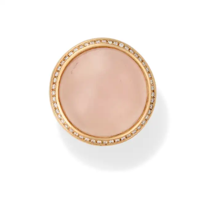 TIRISI, A ROSE QUARTZ AND DIAMOND DRESS RING in 18ct rose gold, set with a round cabochon rose