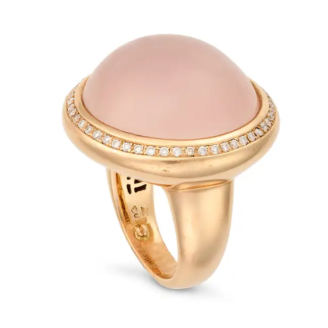 TIRISI, A ROSE QUARTZ AND DIAMOND DRESS RING in 18ct rose gold, set with a round cabochon rose