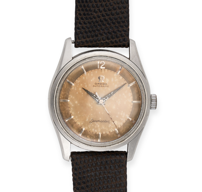 OMEGA - A VINTAGE OMEGA SEAMASTER AUTOMATIC in stainless steel, the circular dial with patination, applied pencil markers and dauphine hands, to an aftermarket Cartier leather strap, 32mm, 36.5g